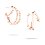 Die Echtzeit Creole - Modern Lines von Echtzeit präsentiert sich als elegante 3-in-1-Creole in Roségold mit kunstvoll ineinander verschlungenen offenen Schlaufen vor weißem Hintergrund.