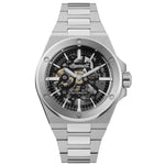 Die Ingersoll Herren Armbanduhr - The Baller zeichnet sich durch ein Edelstahldesign mit einem auffälligen Skelettzifferblatt aus, das sichtbare Zahnräder und das charakteristische Ingersoll-Branding auf dem Zifferblatt zeigt.