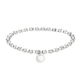 Das LIEBESKIND BERLIN Set - Silver Berry Everyday von Liebeskind Berlin besteht aus einem silbernen Perlenarmband mit einem runden, eingravierten Anhänger, ideal zum Stapeln oder um ein elegantes Uhr Set Damen zu vervollständigen. Abgebildet auf einem weißen Hintergrund.