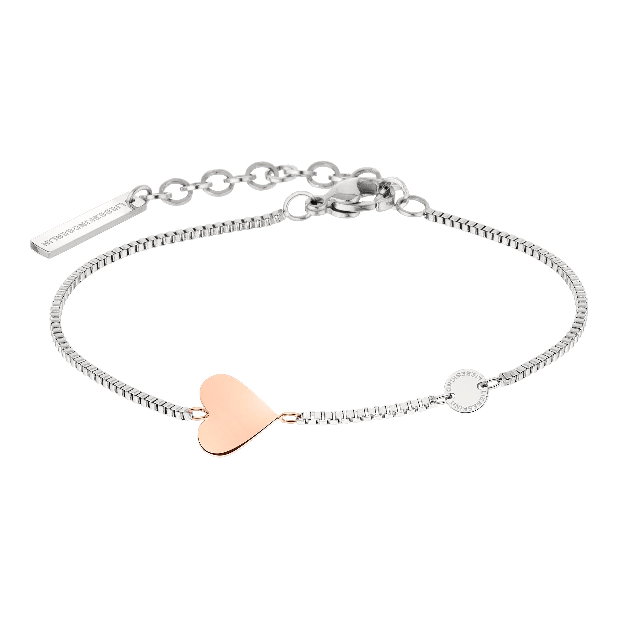 Das LIEBESKIND BERLIN Set - Bicolor Coins von Liebeskind Berlin besteht aus einem silbernen Armband mit roségoldenen Anhängern und einer verstellbaren Kette, die auf weißem Hintergrund abgebildet ist - perfekt für stilvolle Accessoires.
