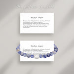 Sky Eye Jasper Beads Armband auf Karte, die die Bedeutung der Halbedelsteine erklärt: Mit exquisiten Halbedelsteinen ist dieses Armband Schmuckstück und Talisman zugleich.
Der Himmelsauge Jaspis soll die Fantasie seines Trägers beflügeln, seine Kreativität steigern und ihn bei der Umsetzung seiner Ideen und Ziele unterstützen.
