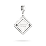 Silberner Liebeskind Berlin Charm mit drehbarem Plättchen, graviertem Stier-Zodiac-Symbol auf der einen und Logoschriftzug auf der anderen Seite; Produktbild