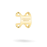 Der LIEBESKIND BERLIN Ear Cuff - The Secure Tag von Liebeskind Berlin verfügt über ein goldfarbenes Cutout-Design mit der Markengravur, was diesen stilvollen Ohrschmuck perfekt für jeden Anlass macht.