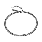 Die LIEBESKIND BERLIN Fußkette - Sparkling With Layers von Liebeskind Berlin ist ein schickes, mehrsträngiges, schwarzes Fußkettchen mit verstellbarem Verschluss und rechteckigem Anhänger, der den unverkennbaren Stil der Marke widerspiegelt.