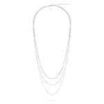 Die LIEBESKIND BERLIN Halskette - Sparkling With Layers ist eine dreilagige Silberkette mit zartem, minimalistischem Design von Liebeskind Berlin auf weißem Grund.