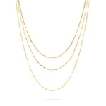 Die LIEBESKIND BERLIN Halskette - Sparkling With Layers von Liebeskind Berlin besteht aus vier eleganten Goldketten mit unterschiedlichen Gliedern, die auf einem weißen Hintergrund wunderschön zur Geltung kommen.