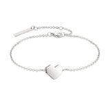 Das LIEBESKIND BERLIN Set - Lovely Basic Silver von Liebeskind Berlin besteht aus einem silbernen Kettenarmband mit Herz und Anhängern - ideal zum Kombinieren mit Ihrer Liebeskind Berlin oder einer anderen silbernen Uhr für einen eleganten Touch.