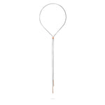 Die LIEBESKIND BERLIN Halskette - The Everyday Combination ist eine elegante, silberne, verstellbare Y-Kette mit einer Schlaufe und zwei vertikalen Stabanhängern, gefertigt aus Edelstahl von Liebeskind Berlin.