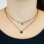 Die LIEBESKIND BERLIN Halskette - Layered Love von Liebeskind Berlin kombiniert eine Kette mit schwarzem Herzanhänger und eine zweite mit rundem Charme - stilvoll im angesagten Layer-Look.