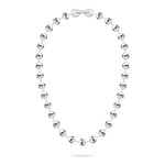 Die LIEBESKIND BERLIN Halskette - Steel Ball von Liebeskind Berlin aus polierten, runden Edelstahlperlen mit praktischem Verschluss wird stilvoll auf weißem Hintergrund präsentiert.