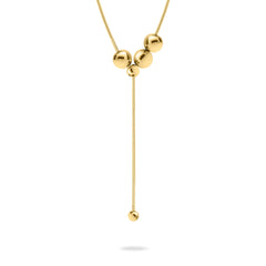 Die LIEBESKIND BERLIN Halskette - Steel Ball ist eine minimalistische Y-Kette mit polierten Goldperlen und einer langen, baumelnden Kette von Liebeskind Berlin.