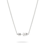 Die LIEBESKIND BERLIN Halskette - Steel Ball von Liebeskind Berlin besticht durch zwei runde Perlen und einen rechteckigen Mittelanhänger - ein elegantes, minimalistisches Accessoire auf weißem Hintergrund.