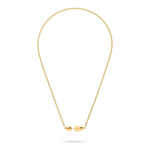 LIEBESKIND BERLIN Halskette - Steel Ball von Liebeskind Berlin: Goldfarbene Halskette mit kleinem, rundem Verschluss und minimalistischem Design, dargestellt auf weißem Hintergrund.