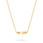 Die LIEBESKIND BERLIN Halskette - Steel Ball von Liebeskind Berlin präsentiert sich mit zwei runden Perlen und einem innovativen Verschluss in minimalistischem Design an einer goldenen Kette vor weißem Hintergrund.