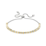 Das Liebeskind Berlin Armband - The Small Luxury ist ein elegantes Accessoire von Liebeskind Berlin. Es ist filigran in Gold und Silber mit geometrischen Perlen und einem Schiebeverschluss gestaltet.