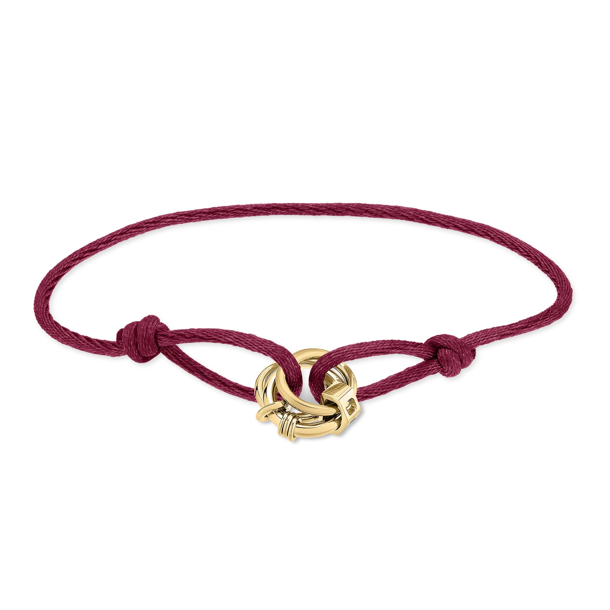 Das LIEBESKIND BERLIN Armband - Lora besteht aus einem burgunderroten Stoffband mit ineinandergreifenden goldenen Ringen in der Mitte, die mit einem einfachen Knoten gebunden werden - ein stilvolles Damen Accessoire von Liebeskind Berlin.