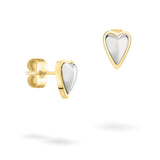 Die LIEBESKIND BERLIN Ohrstecker - Metal Heart von Liebeskind Berlin sind gold- und silberfarbene Ohrstecker in Herzform mit Schmetterlingsverschluss, die jedem Outfit einen eleganten Touch verleihen. Abgebildet auf einem weißen Hintergrund.