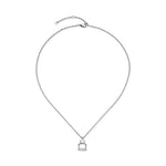 Die silberne LIEBESKIND BERLIN Halskette - Steel Diamond von Liebeskind Berlin zeigt einen kleinen, quadratischen Anhänger in Form eines Parfümflakons auf weißem Grund.
