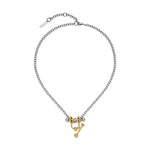 Die LIEBESKIND BERLIN Halskette - Urban Chic von Liebeskind Berlin besteht aus einer silbernen Kette mit goldenen runden und stabförmigen Anhängern im Bicolor-Stil, die das zeitlose Design auf weißem Hintergrund unterstreichen.