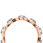 Der Ring LIEBESKIND BERLIN - Glass Heart in 54 von Liebeskind Berlin besticht durch sein stilvolles Design mit hellblauen Edelsteinen und Roségold-Finish, das ihn zu einem außergewöhnlichen Schmuckstück für jeden Anlass macht. Hier aus einem seitlichen Winkel gezeigt.