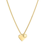 Das LIEBESKIND BERLIN Set - The Classy Heart ist eine goldene Edelstahlkette mit Herzanhänger und graviertem, kleinem rundem Charm von Liebeskind Berlin.