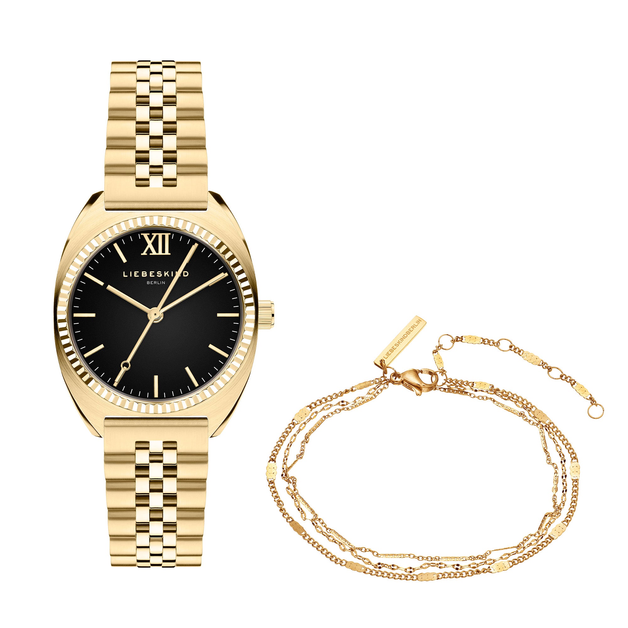 Das LIEBESKIND BERLIN Set - Gold Everyday Layering von Liebeskind Berlin umfasst eine goldene Uhr mit schwarzem Zifferblatt und filigranem Goldkettenarmband - ideal für den modernen Layering-Look.