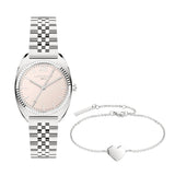 Das LIEBESKIND BERLIN Set - Lovely Basic Silver von Liebeskind Berlin kombiniert eine silberne Uhr mit zart rosafarbenem Zifferblatt und ein Armband mit Herzanhänger - ein elegantes Duo für jeden Look.