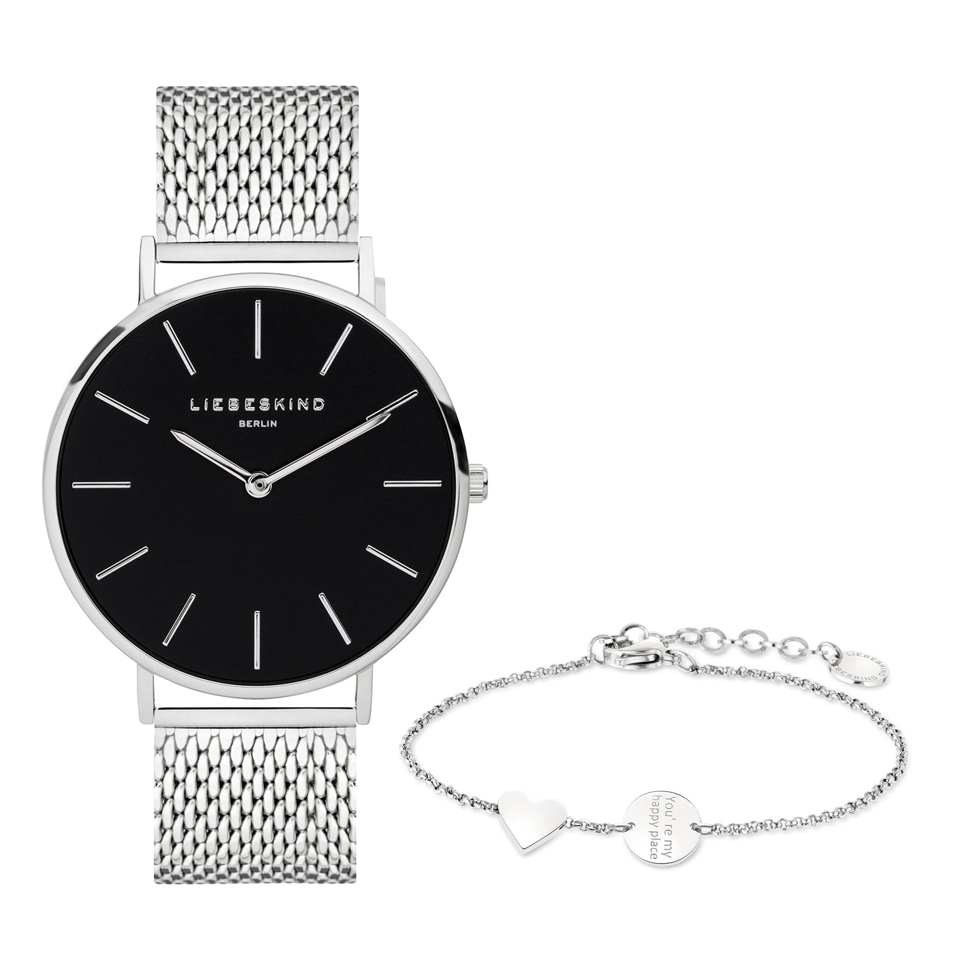 Das Liebeskind Berlin Set - Lovely Silver Basic kombiniert eine silberne Uhr mit schwarzem Zifferblatt und ein feines Armband mit Herzanhänger - das ideale Accessoire für elegante Damen.