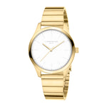 Die LIEBESKIND BERLIN Armbanduhr - The Round Staple besticht durch ein goldfarbenes Metall-Gliederarmband, ein weißes Zifferblatt und ihr minimalistisches, modernes Design.