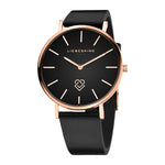 Die LIEBESKIND BERLIN Armbanduhr - Keep Loving von Liebeskind Berlin hat ein roségoldenes Gehäuse, ein schwarzes Lederarmband, ein minimalistisches Zifferblatt und ein Logo - eine stilvolle Uhr für jede Gelegenheit.