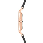 Seitenansicht der schlanken, roségoldenen LIEBESKIND BERLIN Armbanduhr - The Modern Must-Have von Liebeskind Berlin, mit schwarzem Lederarmband, Krone und Bandanstößen - ein Musterbeispiel für skandinavisch inspiriertes Design.