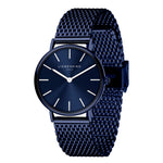 Die LIEBESKIND BERLIN Armbanduhr - Color Up zeichnet sich durch ein elegantes marineblaues Netzband und ein minimalistisches Zifferblatt im skandinavischen Stil von Liebeskind Berlin aus.