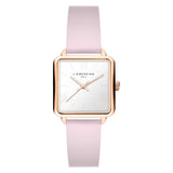 Die LIEBESKIND BERLIN Armbanduhr - The Classic Square hat ein quadratisches Zifferblatt, skandinavisches Design, ein Gehäuse aus Roségold und ein hellrosa Lederarmband von Liebeskind Berlin.