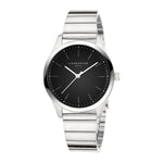 Die LIEBESKIND BERLIN Armbanduhr - The Round Staple ist ein Damenmodell mit schwarzem Zifferblatt, minimalistisch modernem Design und einem silbernen Edelstahlband von Liebeskind Berlin.