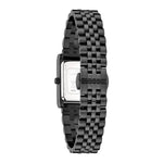 Die LIEBESKIND BERLIN Armbanduhr - Small Retro von Liebeskind Berlin hat ein rechteckiges Zifferblatt aus schwarzem Metall und ein Gliederarmband, das von hinten gezeigt wird, um das stilvolle Design zu unterstreichen.