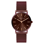 Die LIEBESKIND BERLIN Armbanduhr - The Everyday Must-Have von Liebeskind Berlin verfügt über ein braunes Netzarmband und ein Zifferblatt mit minimalistischem skandinavischem Design.