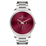 Die LIEBESKIND BERLIN Armbanduhr - Classic x Trends verfügt über ein silbernes Gehäuse, ein rotes Zifferblatt mit Tages- und Datumsanzeige und das Markenlogo - eine schicke, vom skandinavischen Design inspirierte Damenuhr.