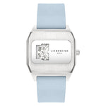 Die LIEBESKIND BERLIN Armbanduhr - Jump Hour von Liebeskind Berlin ist eine quadratische, silberne Uhr mit blauem Armband und einzigartigem, drehbarem, nummeriertem Zifferblatt, inspiriert vom authentischen Stil der 70er Jahre.
