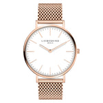 Die LIEBESKIND BERLIN Armbanduhr - Timeless Must Have von pro/concept Vermarktungs GmbH verfügt über ein roségoldenes Mesh-Armband, ein weißes Zifferblatt, minimalistische Stundenmarkierungen und ein Easy-Change-System für mühelose Style-Updates.