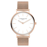 Die LIEBESKIND BERLIN Armbanduhr - Timeless Must Have von pro/concept Vermarktungs GmbH verfügt über ein roségoldenes Mesh-Armband, ein weißes Zifferblatt, minimalistische Stundenmarkierungen und ein Easy-Change-System für mühelose Style-Updates.