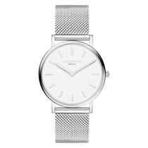 Minimalistisch und elegant: Die Liebeskind Berlin Armbanduhr - Pure Elegance mit Edelstahl-Mesharmband, weißem Zifferblatt sowie silbernen Stundenmarkern und Zeigern.