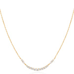 Ania Haie Halskette - Gold Arc Pavé: Eine goldplattierte 925 Sterling Silber Kette von Ania Haie mit geschwungener Reihe funkelnder weißer Zirkonia-Steine im Zentrum.