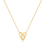 Die Ania Haie Halskette - Gold Heart Kiss Pavé besticht durch ein zartes X-Detail mit funkelnden Zirkonia auf einem herzförmigen Anhänger aus 925 Sterling Silber - elegant und stilvoll von Ania Haie.