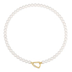 ANIA HAIE Shell Pearl Vergoldete Halskette – feine Ankerkette aus Gelbgold mit einer schimmernden Muschelperle und glänzendem Kugel-Anhänger.