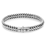 Das Rebel & Rose Armband Apollo aus 925er Sterlingsilber besticht mit Kettengliedern, zylindrischem Verschluss graviert mit Rebel & Rose und rundem Logo.