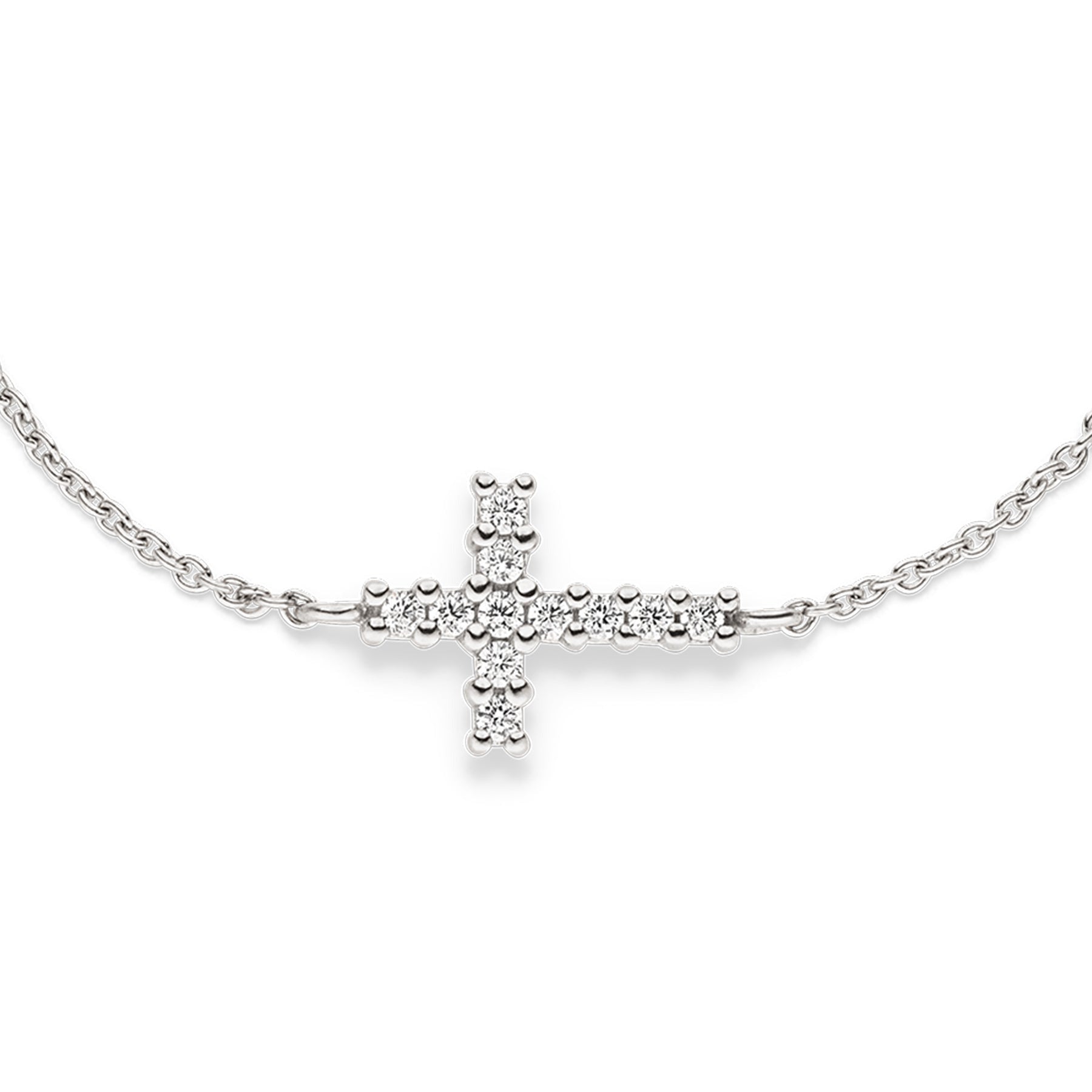 Silberfarbenes Kinderarmband aus Silber mit filigraner Gliederkette und fest integriertem Kreuz. Das Kreuz ist mit weißen Zirkoniasteinen besetzt.