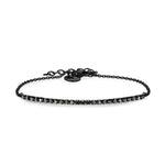Das Tamaris Set - Das Sparkling Black von Tamaris besteht aus einem schwarzen Tennisarmband mit kleinen runden dunklen Steinen in einer Reihe und einem verstellbaren Kettenverschluss - ideal als elegantes Set mit einem Glitzerarmband oder einer schwarzen Uhr.