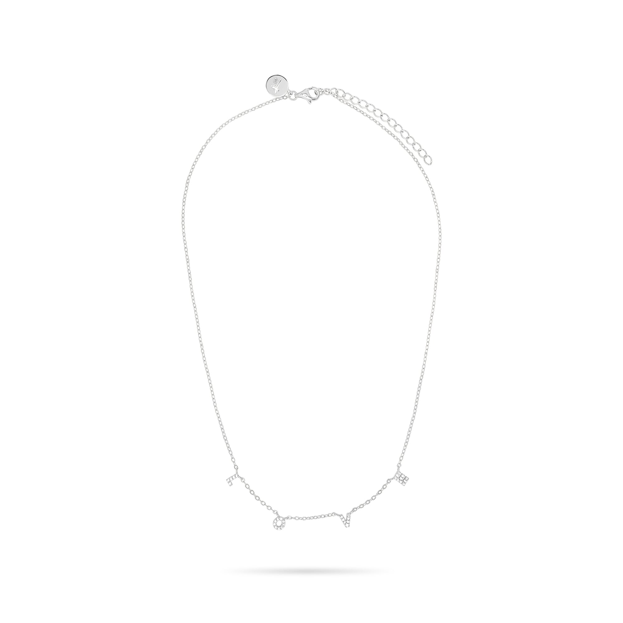 Die Tamaris Halskette aus der Silver Love Collection besticht mit zarten LOVE-Anhängern und funkelnden Zirkoniasteinen, ist längenverstellbar und wird stilvoll auf weißem Hintergrund präsentiert.