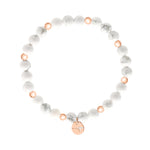 Tamaris Beads Wonderful White Armband mit weißen marmorierten Perlen, roségoldfarbenen Details und rundem Tamaris Anhänger