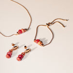 Tamaris Natural Stones Schmuck in Roségold mit rosa Perlen – Halskette, Armband und Ohrringe